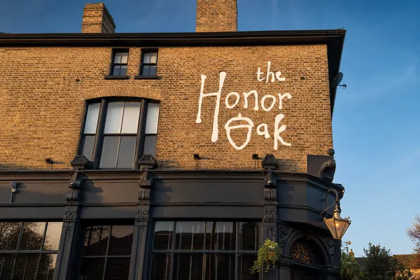 The Honor Oak lettering painted on a pub wall