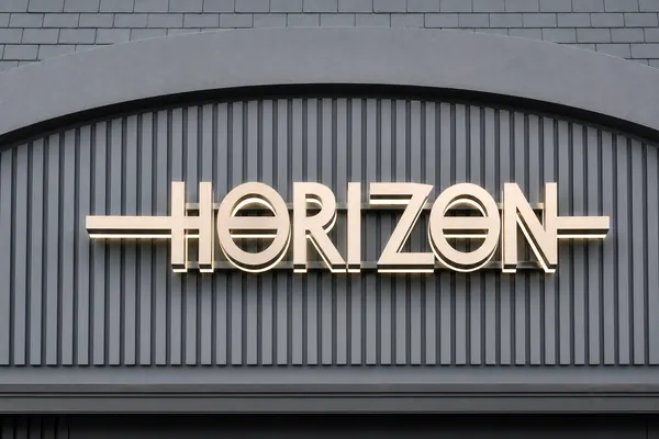 Horizon built-up letters on a grey facade